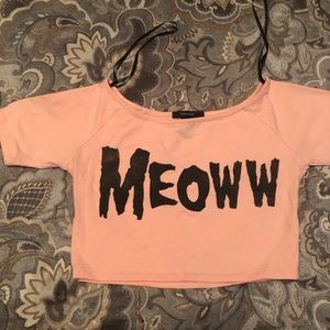 Pale orange crop top great for Halloween with MEOW graphic